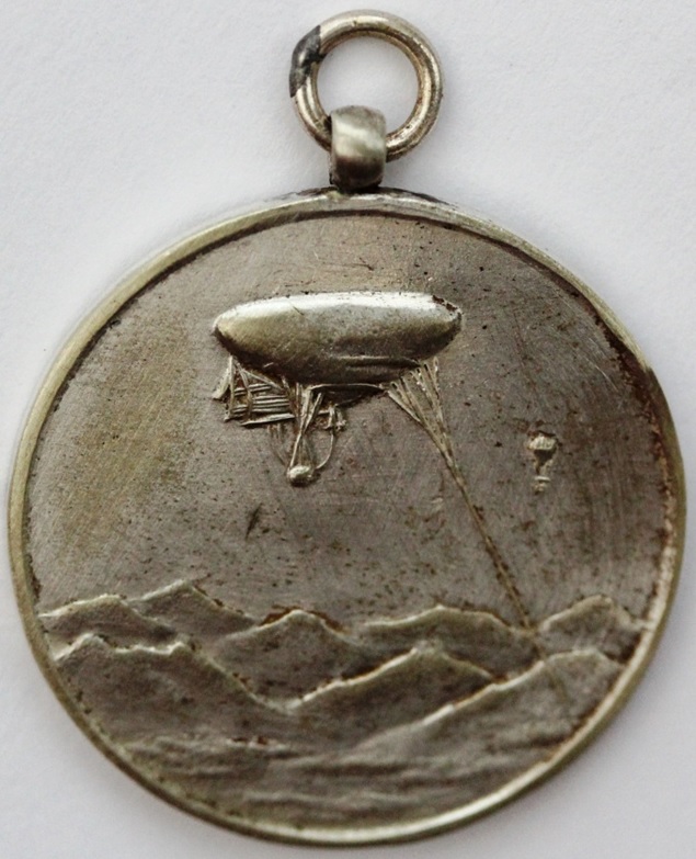 1904 Attacking Russia Commemorative Watch Fob with Observation Balloon.jpg