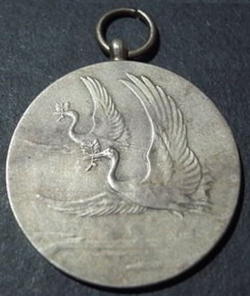 1925  Silver Wedding Anniversary of the Emperor Taisho Commemorative Watch Fob Silver version.jpg