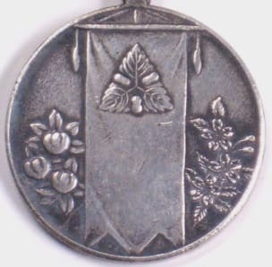 1928 Sericulture  Showa Enthronement Commemorative Watch Fob.jpg