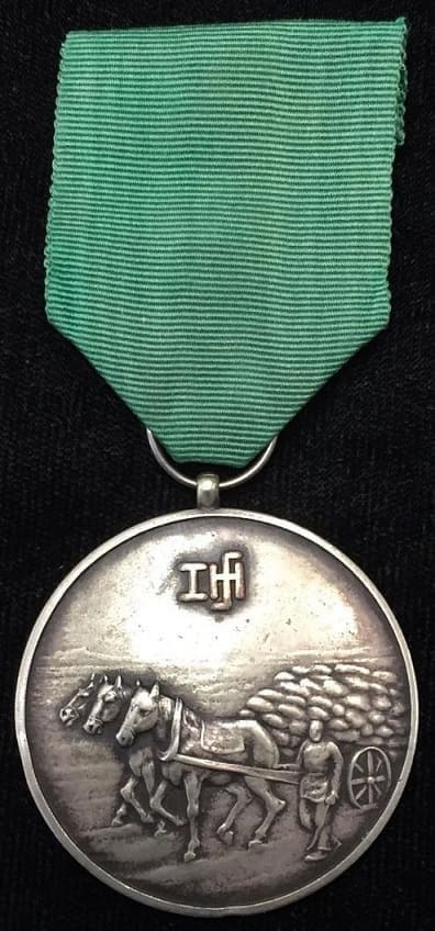 1937  Merit Medal from the  Chairman  of the Andong Province Reconstruction Committee.jpg