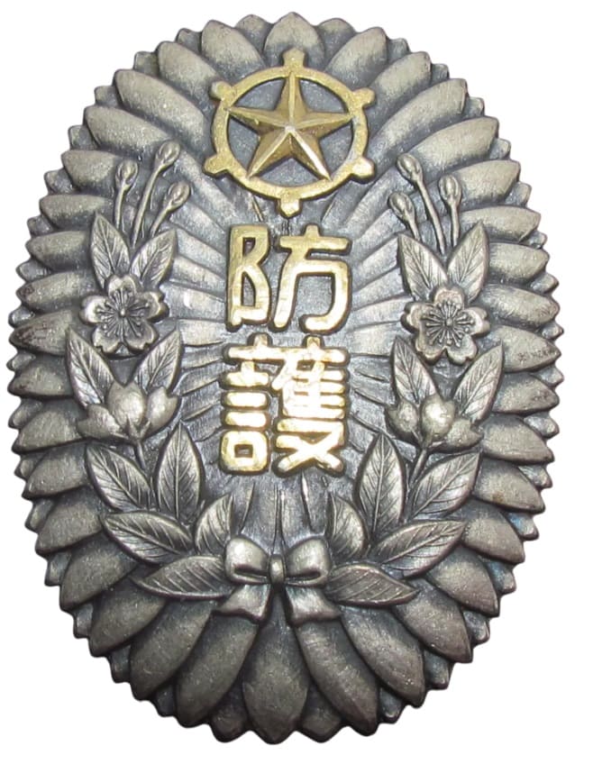 1937 Toshima Ward Air Raid Defense Corps Meritorious Service Badge.jpg 1937 Toshima Ward Air Raid Defense Corps Meritorious Service Badge.jpg