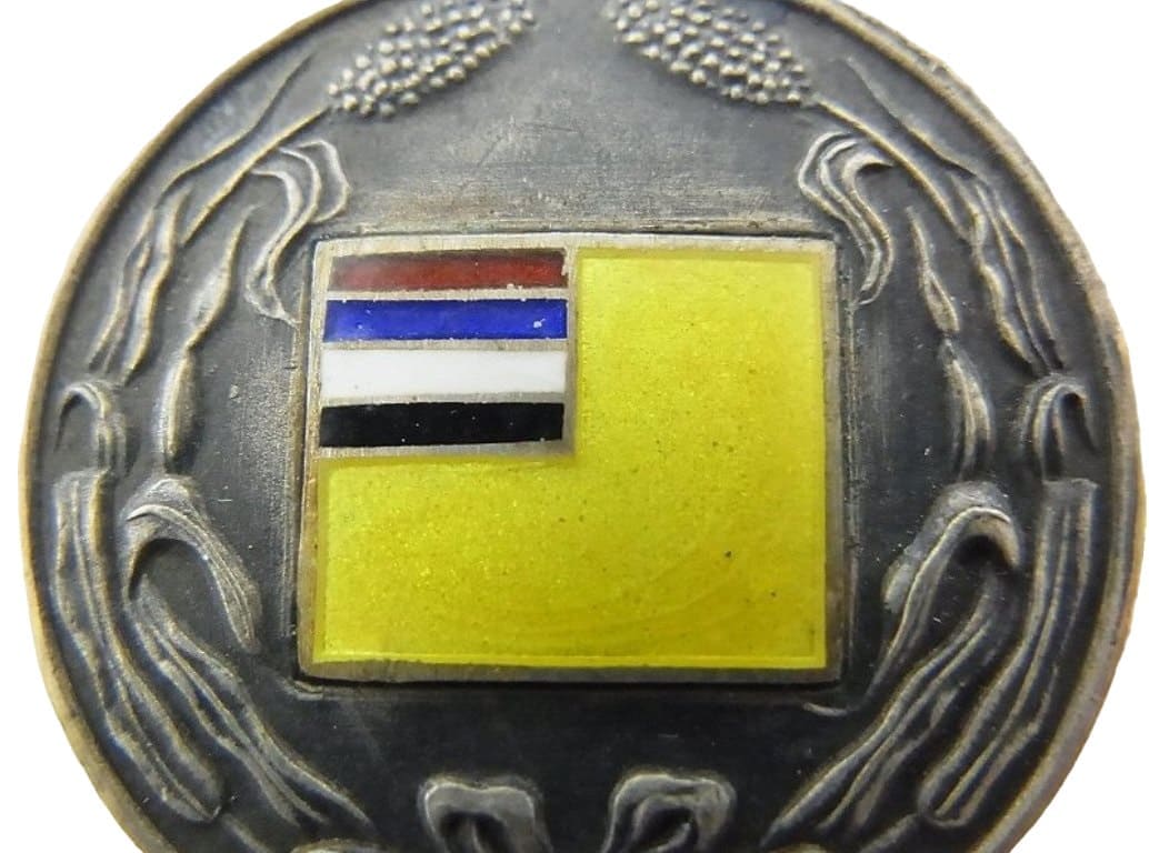 1st Anniversary of Manchukuo Founding Commemorative Watch Fob.jpg