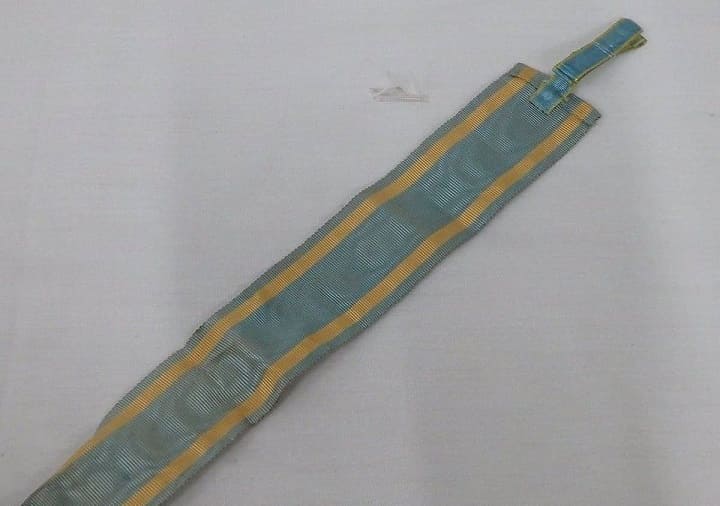 3rd class order of the  Sacred Treasure with a Modified Ribbon Fastener.jpg