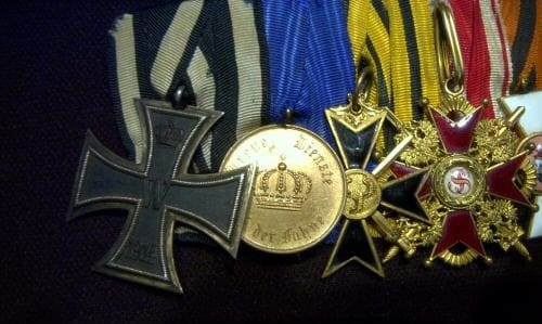 4th class cross  inside of the medal bar of unknown German Freikorps veteran..jpg