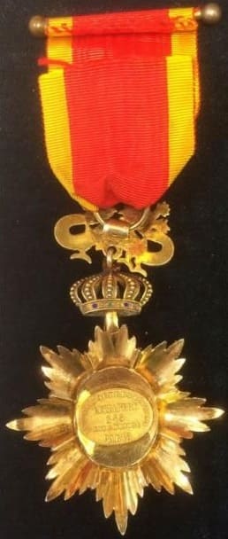 4th class Officer's badge with red with gold border  stripes.jpg