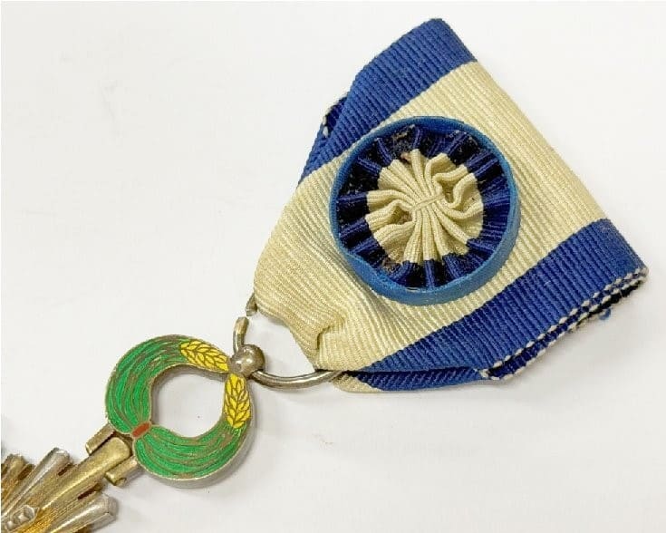 4th class Order of  Precious Brilliant Golden Grain.jpg