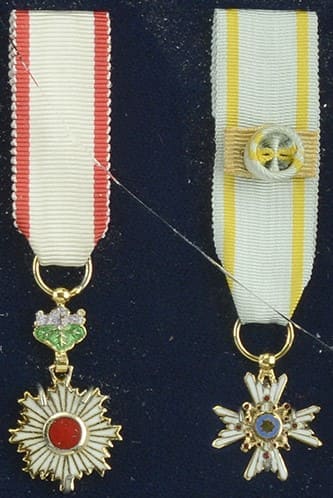 4th class Rising Sun order and 3rd class Sacred Treasure order miniatures.jpg