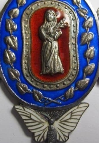 5th class  Meritorious Service Badge of Great Japan Sericulture Association.jpg