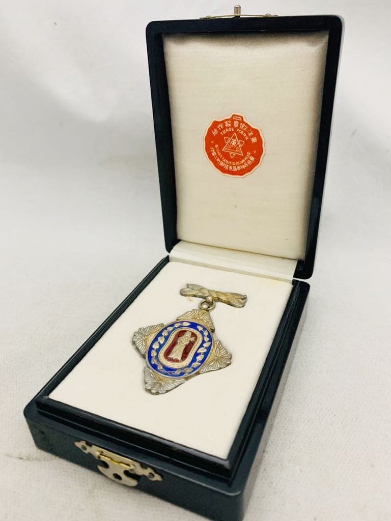 5th class Meritorious Service Badge of Great Japan Sericulture Association.jpg