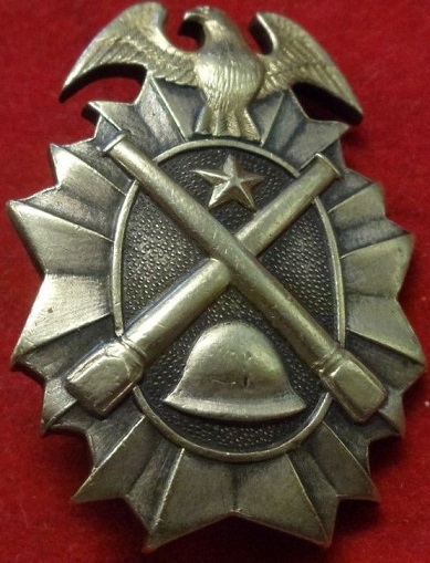 昭和十一年山砲・九 駐満記念章.jpg