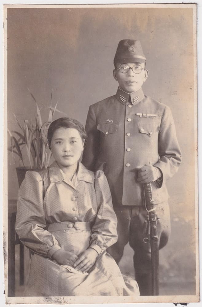 Army Photo Officer with Katana and Lady c.1940's.jpeg