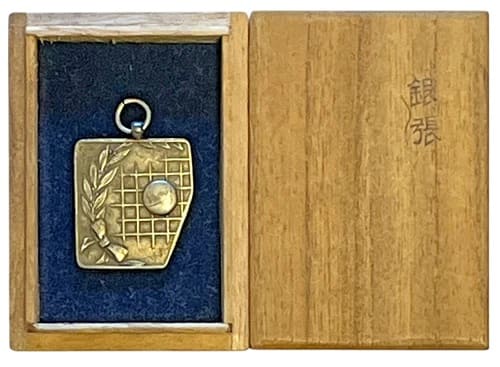 Badge  made by Gingando workshop, Osaka 銀眼堂造.jpg