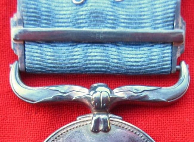 Blue  ribbon medal marked EB.jpg