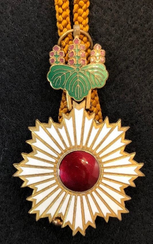 bolo tie clasp from replica of Rising Sun order.jpg