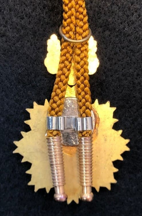 bolo tie clasp  from replica of Rising Sun order.jpg