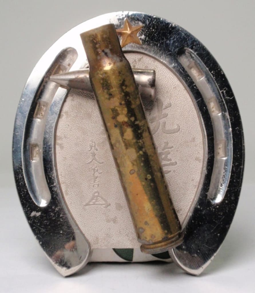Bullet Case on a Horseshoe Commemorative Paperweight 蹄鉄型記念文鎮.jpg