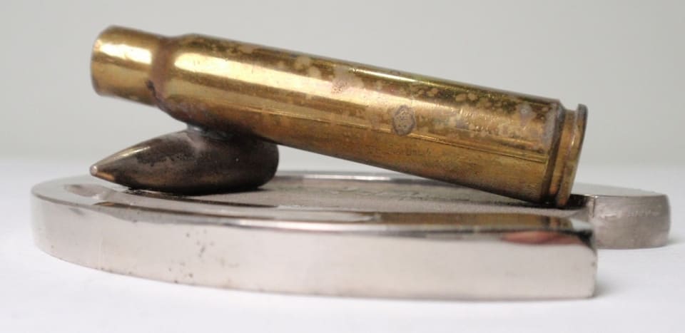 Bullet Case  on a Horseshoe Commemorative Paperweight 蹄鉄型記念文鎮.jpg