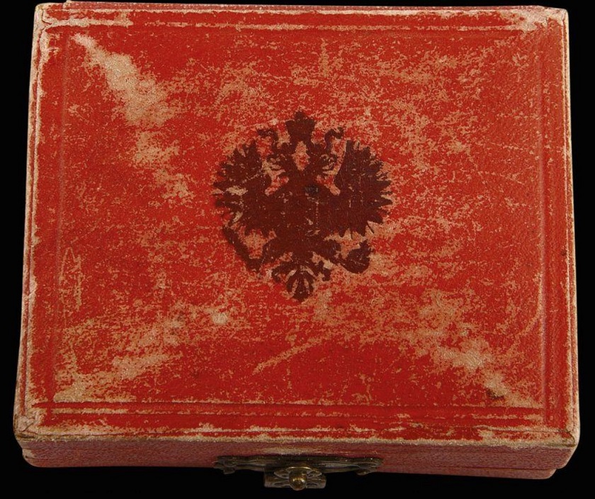 Cased badge for 40 years of service on  St.George ribbon.jpg