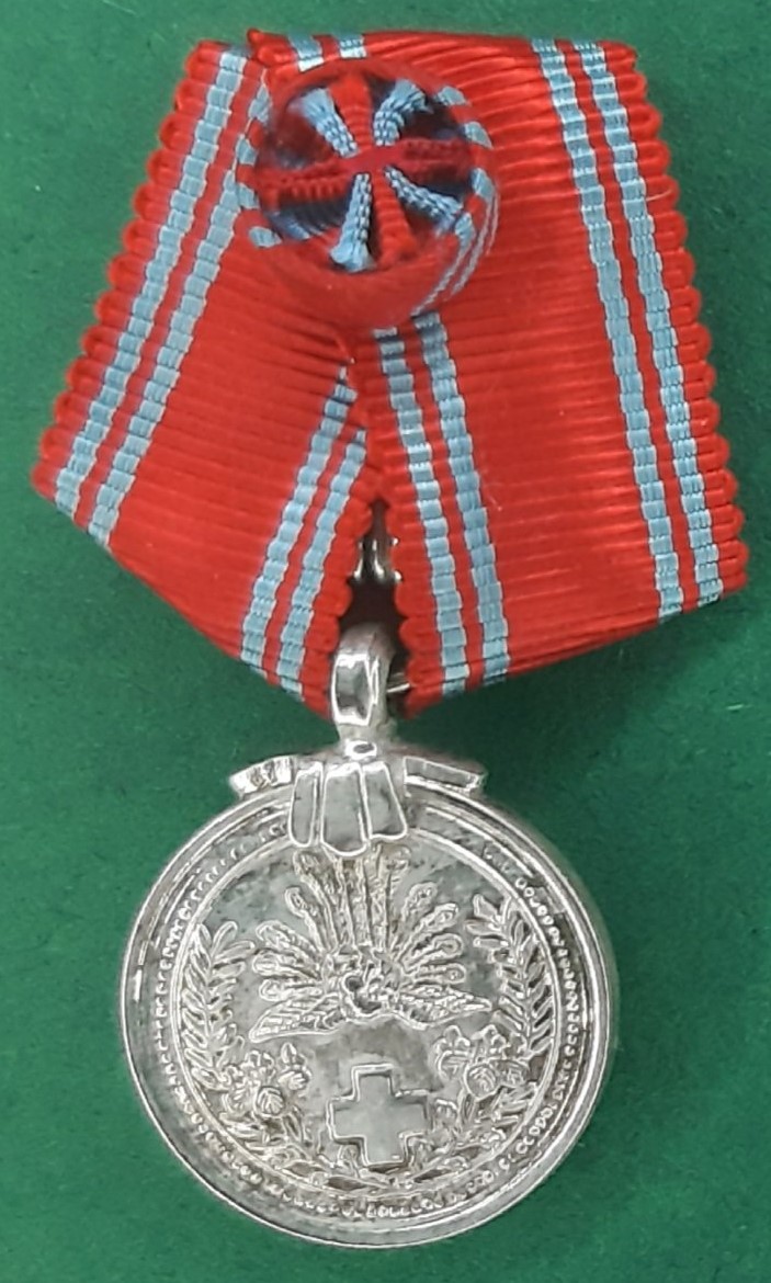 Danish-made miniature of Japanese Red Cross Medal.jpg