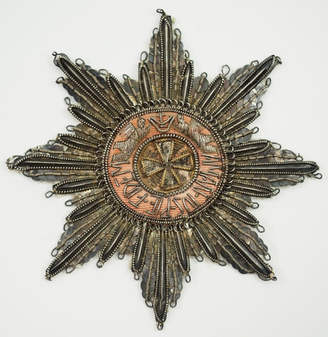 Embroidered breast star of Saint Anna order.jpg