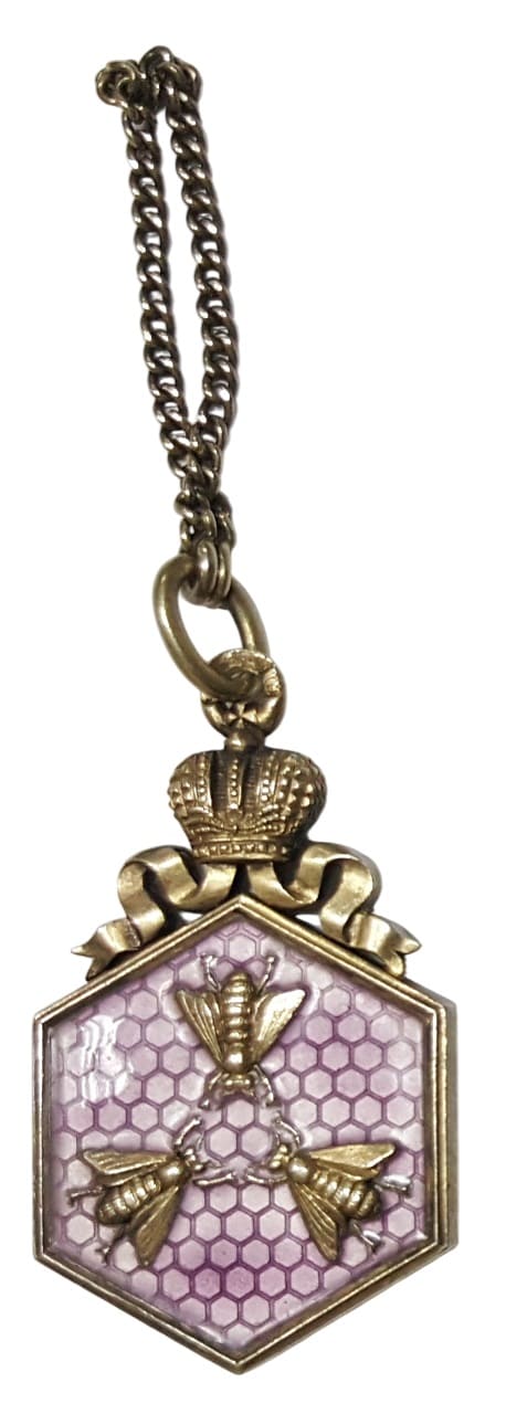 Enameled badge in gilded silver.jpg