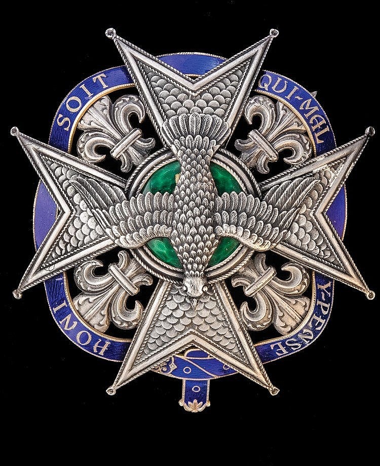 Fake breast star of order of the Holy Spirit combined with the Garter.jpg