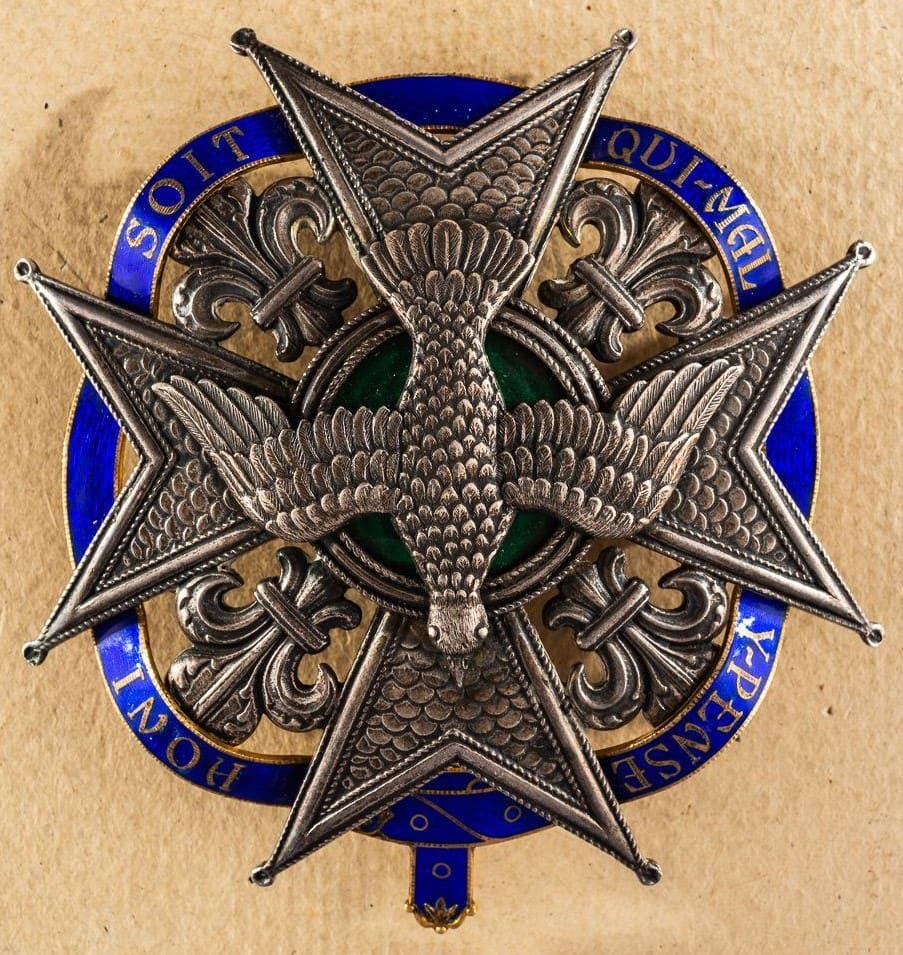 Fake breast star of order of the Holy Spirit combined with the Garter.jpg