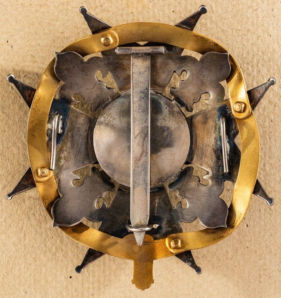 Fake breast star of order of the  Holy Spirit combined with the Garter.jpg
