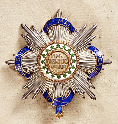 Fake breast star of order of the Rue Crown combined with the Garter.jpg