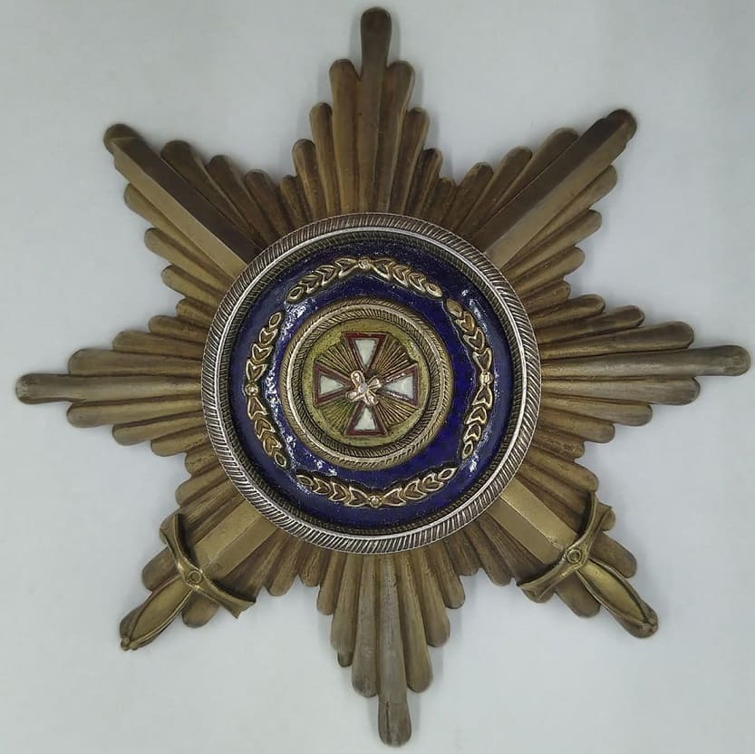 Fake breast star Order of the White Eagle.jpg