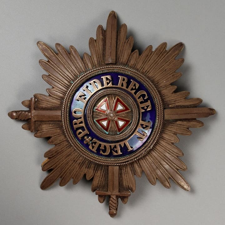 Fake breast star Order of the White Eagle.jpg