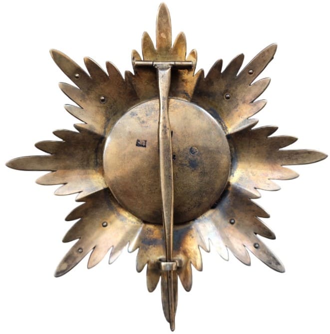 Fake breast star St. Stanislaus  cross with swords.jpg