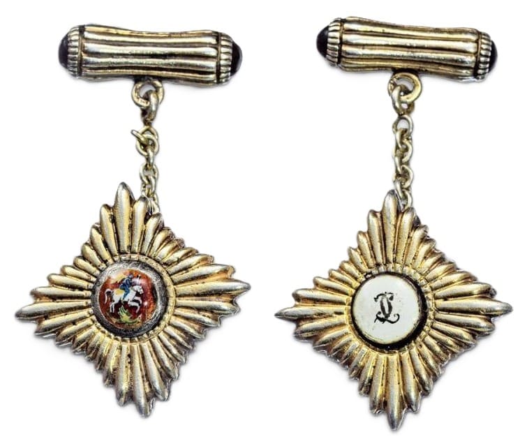 fake cufflinks made by Faberge.jpg