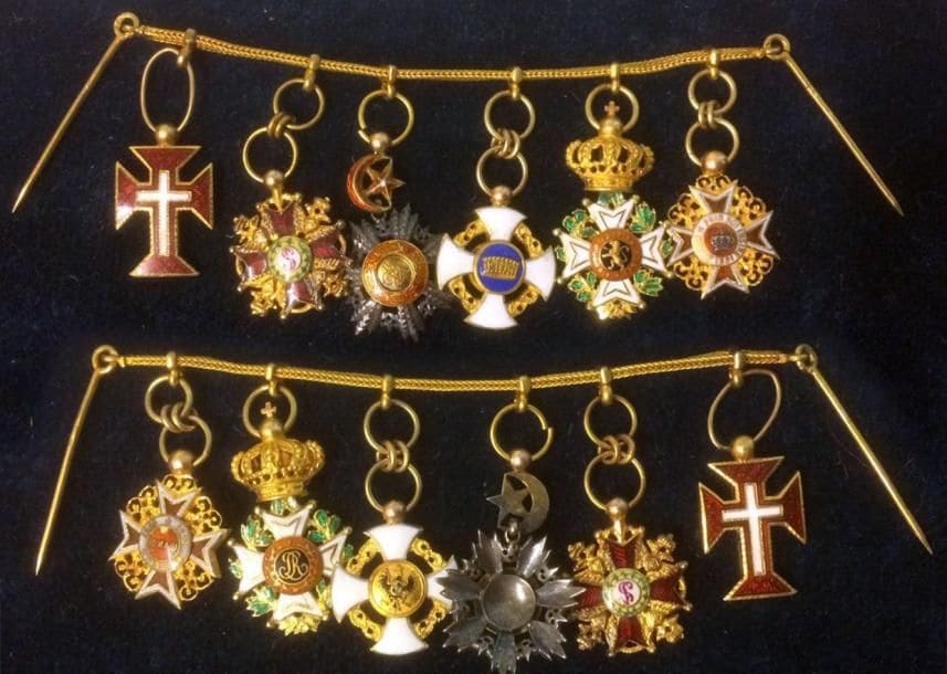 French-made chain with six gold miniatures.jpg