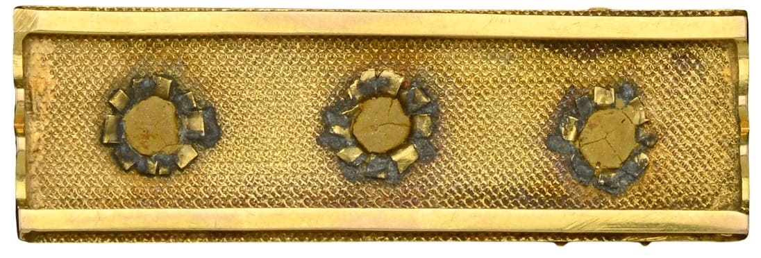 Gold bar with  miniaturesof the Orders of the Bath, Maria Theresa, and St. Vladimir.jpg