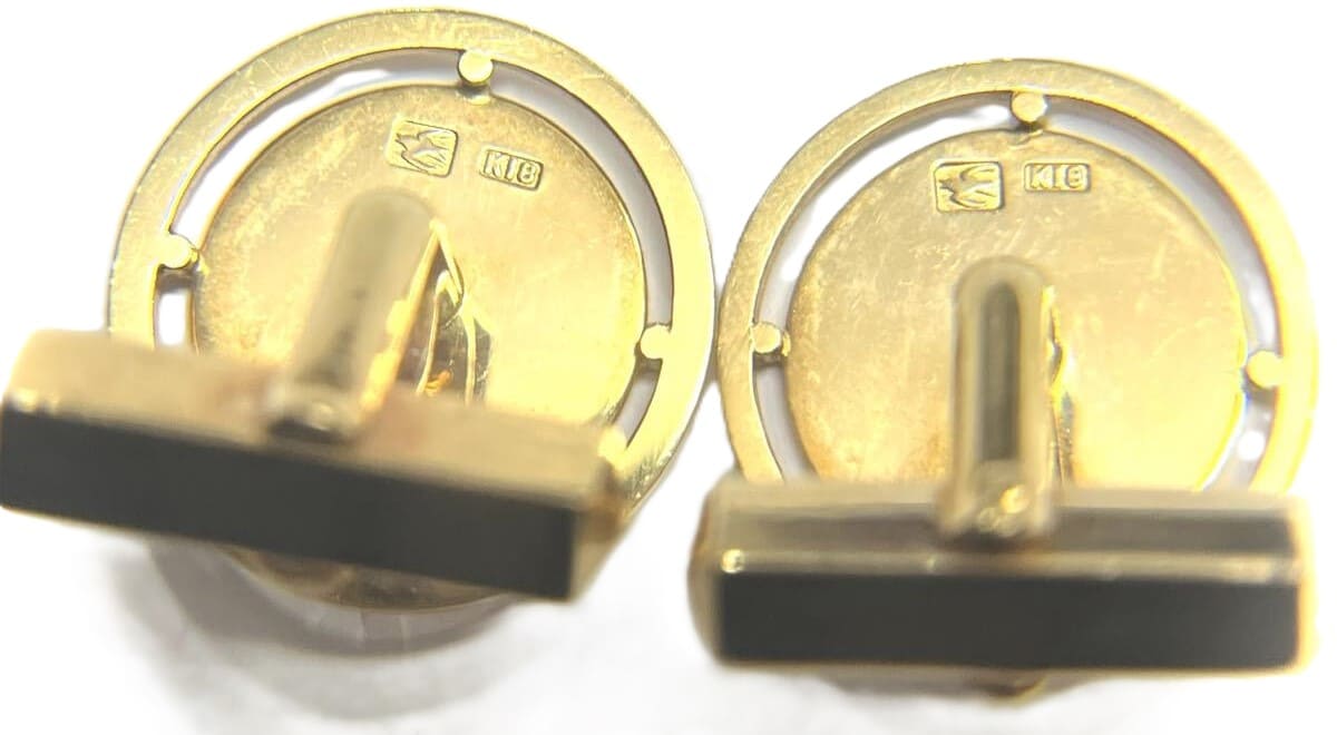 Gold cufflinks made by  Hattori.jpg