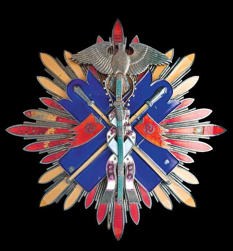 Golden Kite order breast star from Meiji era.jpg Golden Kite order breast star from Meiji era.jpg