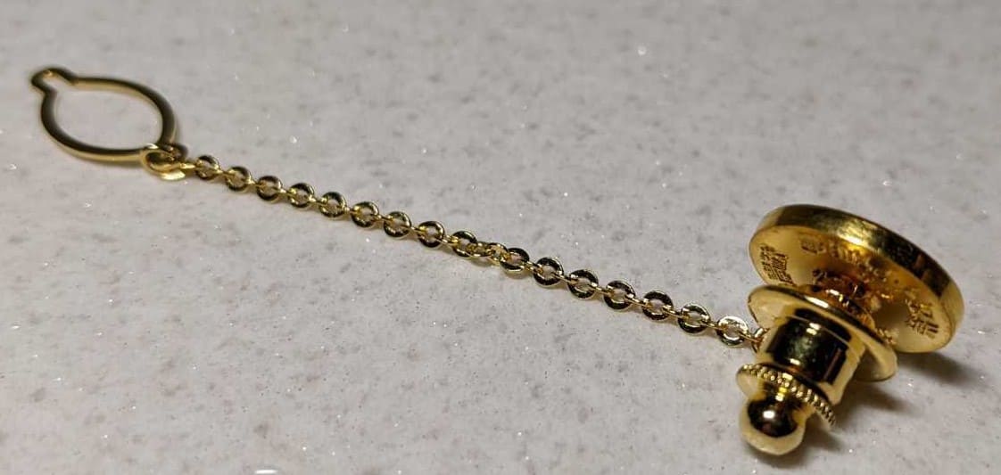 golden lapel  pin  with  diamond.jpg