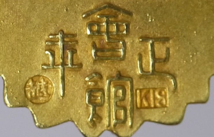 Golden  Watch Fob of Kazoku Kaikan.jpg
