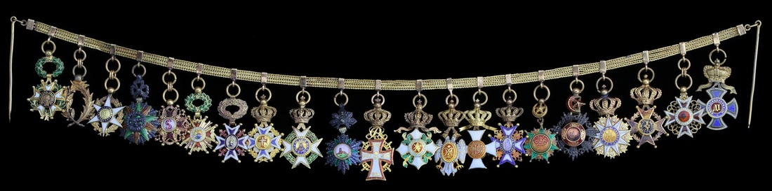 group of 21 miniatures with lion and sun order.jpg