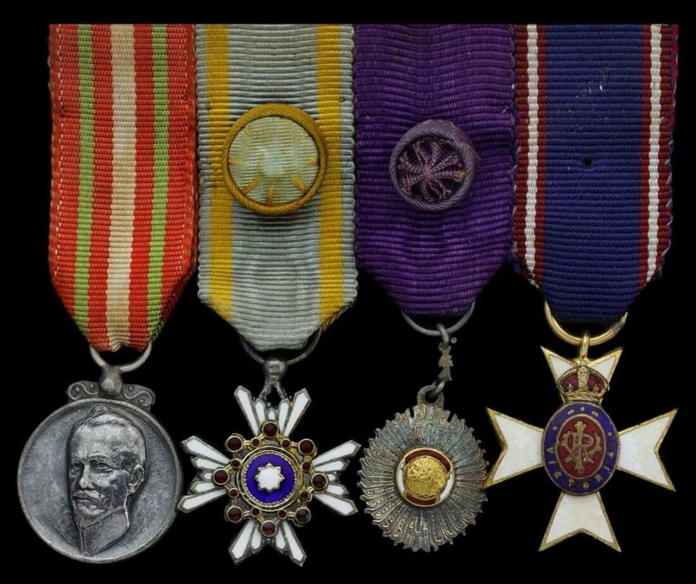 group of four miniature dress medals awarded to a Brasilian diplomat.jpg