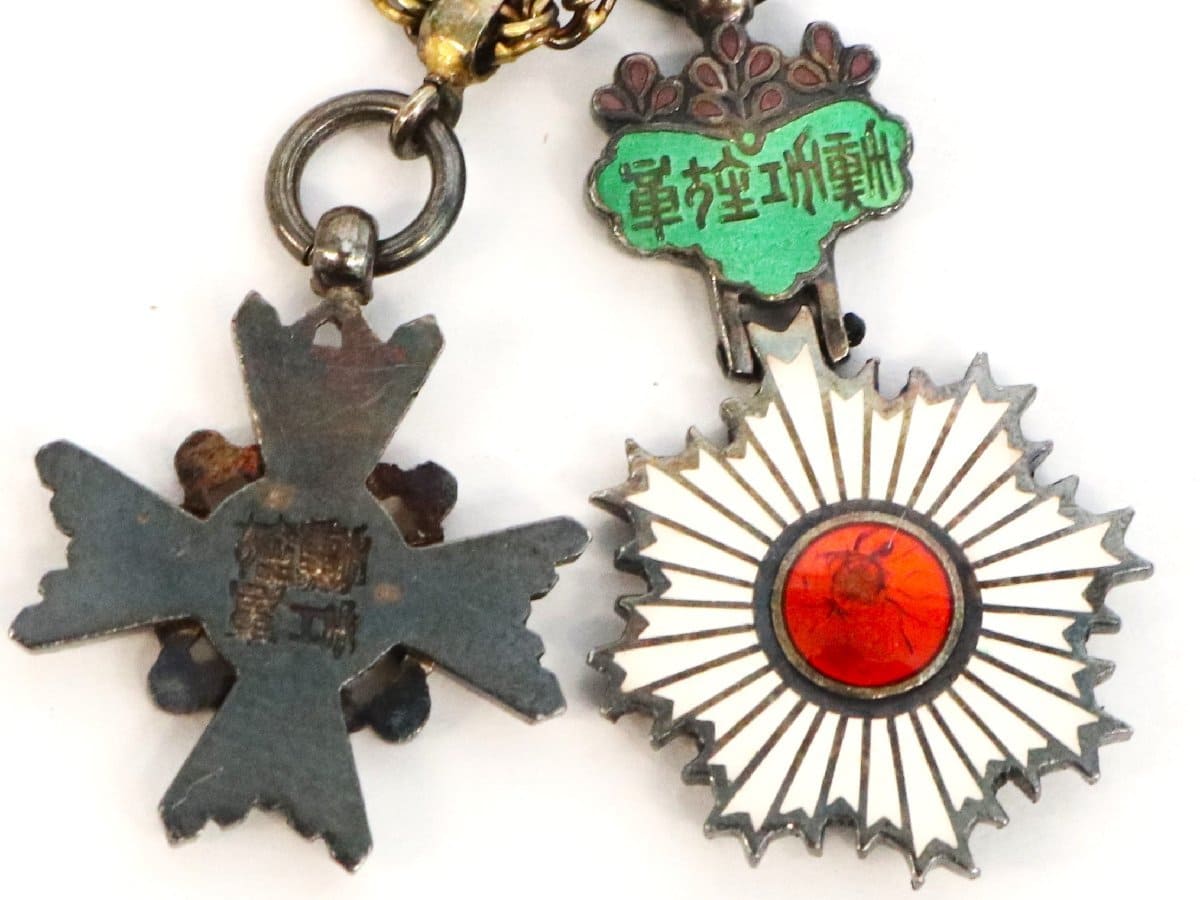 Group of  japanese award miniatures made by Sugimura.jpg