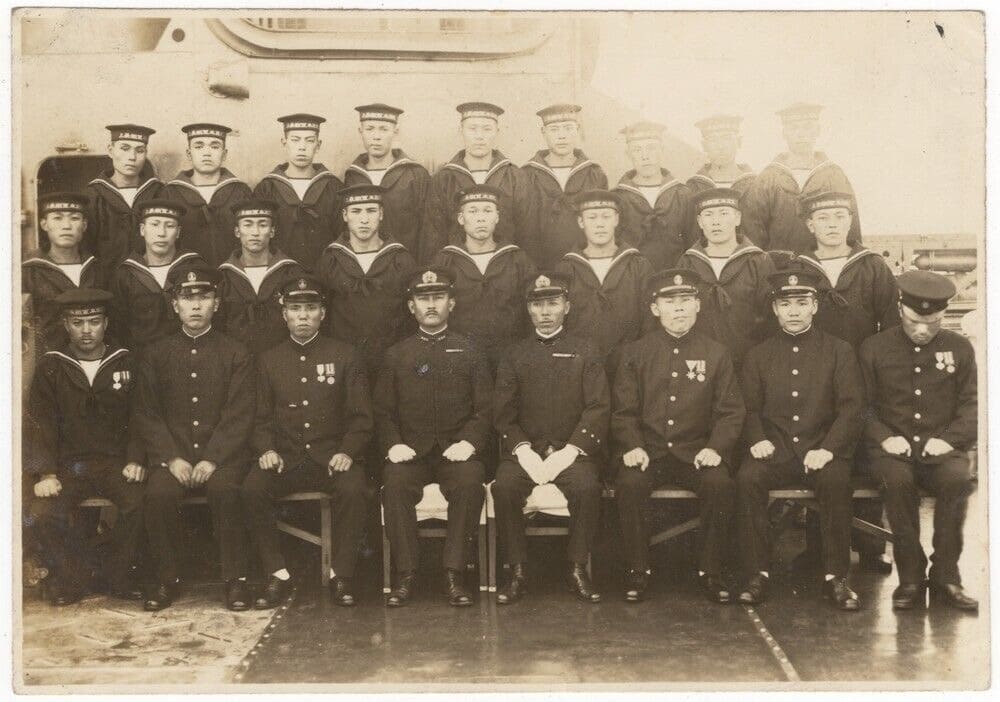 Group photo with a submariner badge.jpg