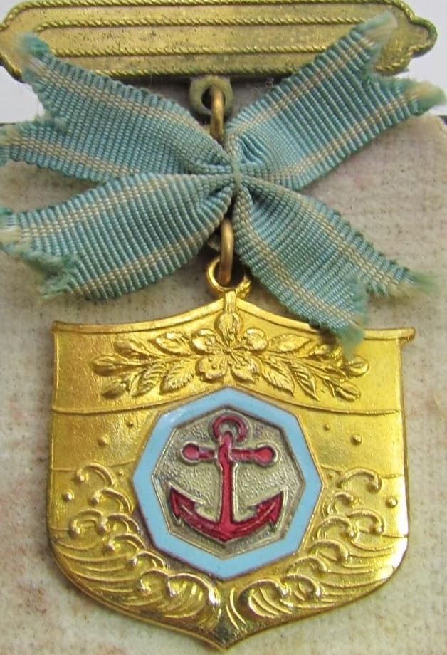 Japan Seafarers Relief Association Male Version of Special Membership Badge.jpg