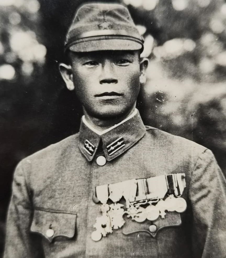 Japanese Lieutenant with Herder medal.jpg