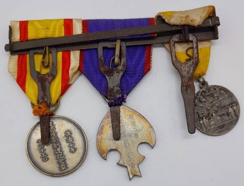 Japanese  medal bar with 1925 Vatican Mission Exposition Medal in Silver.jpg