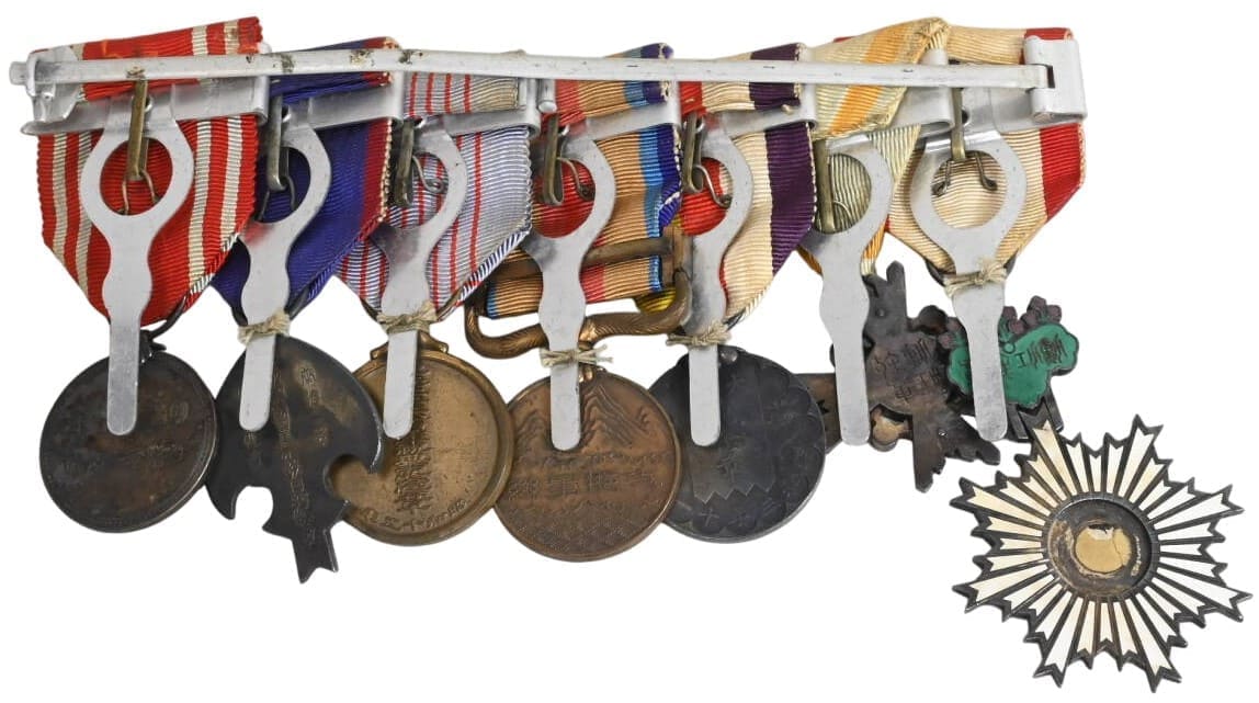 Japanese medal bar with 6th class  Rising Sun order.jpg