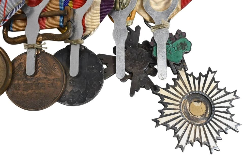 Japanese medal bar with 6th class Rising  Sun order.jpg