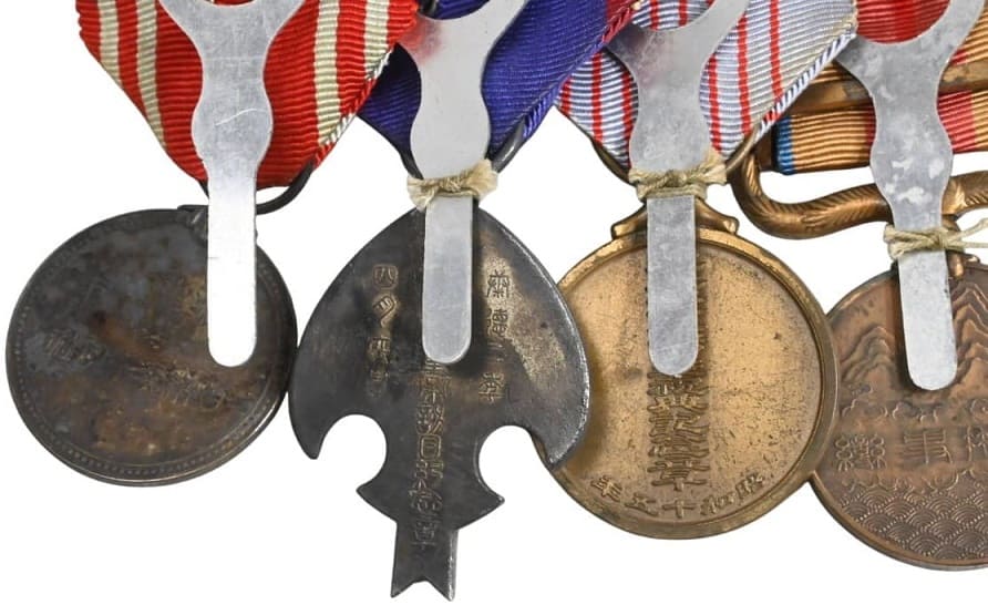 Japanese medal bar with 6th class Rising Sun  order.jpg