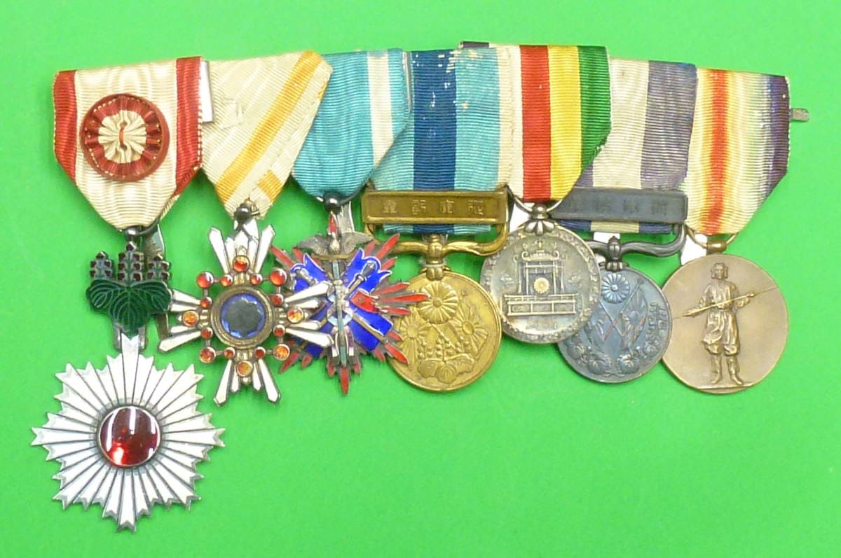Japanese medal bar with golden Kite order.jpg